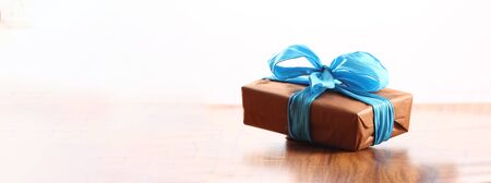 christmas presents with copy space with a ribbon bow on a table