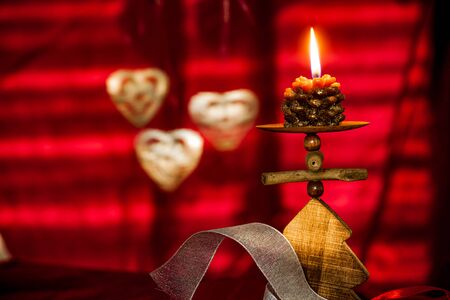 Christmas Background Concepts with Lantern, candles and cookiesの写真素材