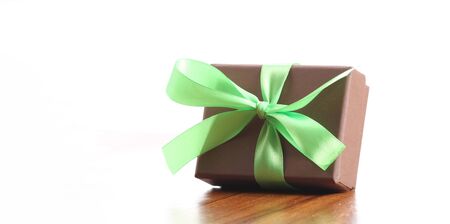 presents in a table with decoration and copy space and a ribbonの写真素材