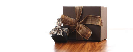 presents in a table with decoration and copy space and a ribbonの写真素材