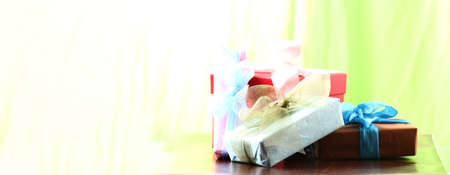 light christmas presents with copy space and bowsの写真素材
