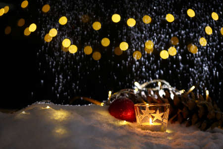 christmas backgrounds with low key lighting with candles and lanternの写真素材