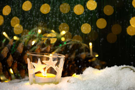 christmas backgrounds with low key lighting with candles and lanternの写真素材
