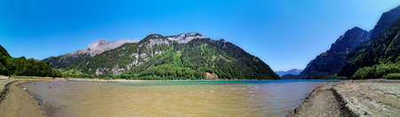 Swiss mountains and lake. Scenic Alps and lane view. Trekking and outdoor lifestyleの写真素材