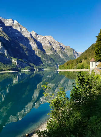 Swiss mountains and lake. Scenic Alps and lane view. Trekking and outdoor lifestyleの写真素材