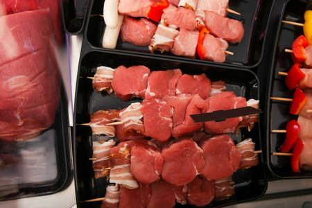 Fresh raw red meat at the butcherの写真素材
