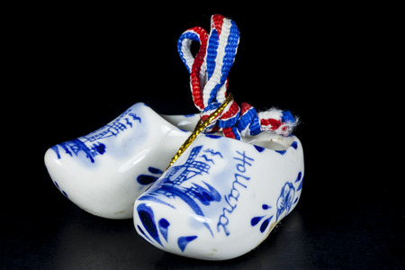 wooden shoes from the Netherlands isolated on black 