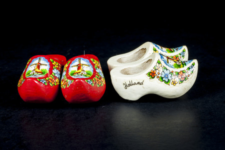 wooden shoes from the netherlands isolated on black 