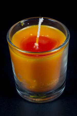 Beautiful Color Candle in Glass on  Backgroundの写真素材