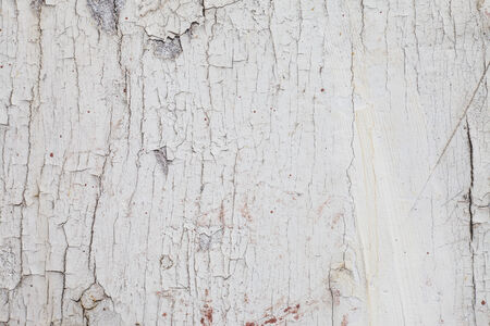 Old wooden wall paint peeling の写真素材