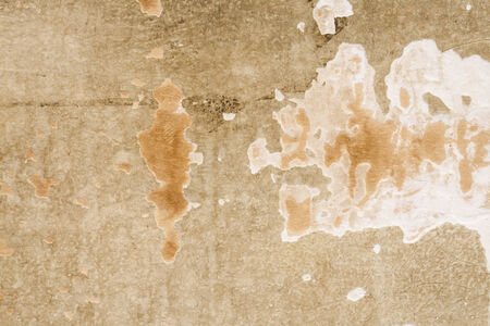 Gypsum wall Old paint peeling background.の写真素材