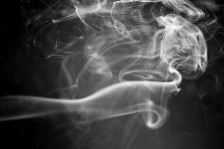 colorful  smoke on black backgroundの写真素材