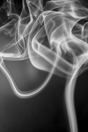 White smoke on black background.の写真素材