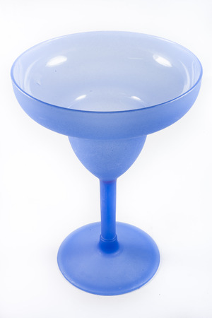 Blue champagne glass on white background.の写真素材