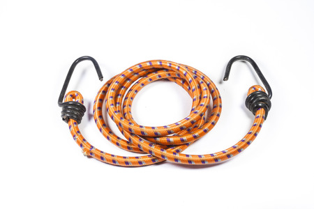 elastic rope with metal hooks on white background.の写真素材