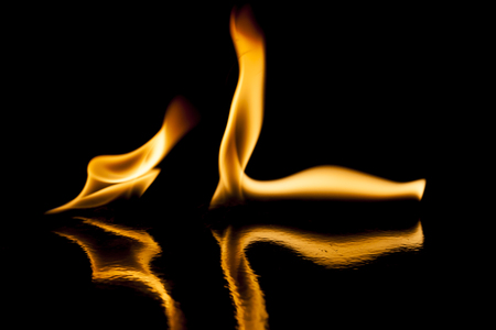 Fire flames on black backgroundの写真素材