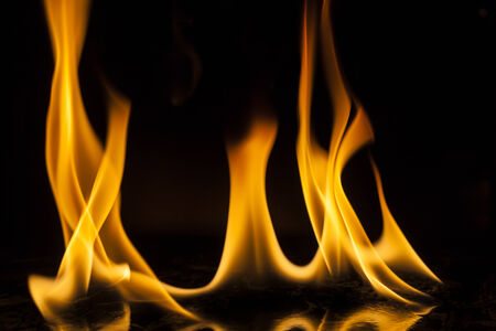 Fire flames on black backgroundの写真素材