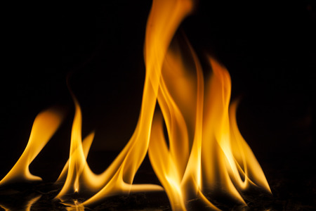 Fire flames on black backgroundの写真素材