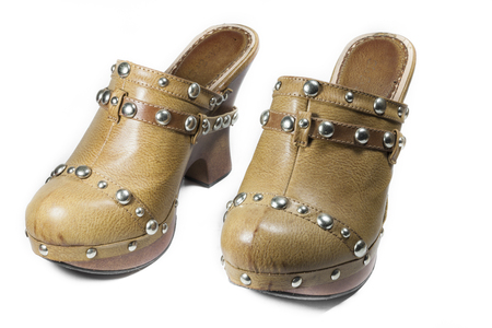 High-heel shoes Women of color cream with metal pins. On white backgroundの写真素材