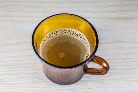 Coffee cup  on wood backgroundの写真素材