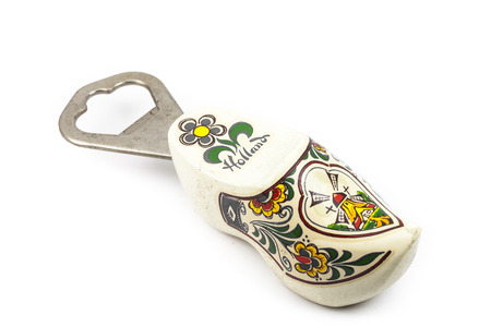 Opener wooden shoe forms Holland. On white backgroundの写真素材