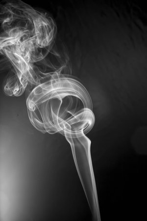 White smoke on black backgroundの写真素材
