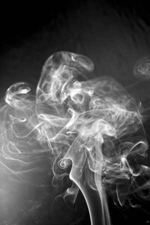White smoke on black backgroundの写真素材