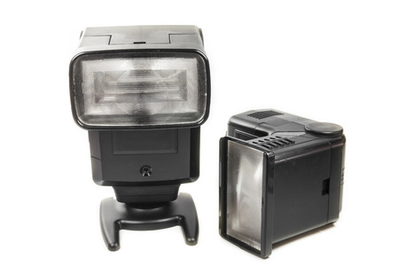 Photo camera flash on white background.の写真素材