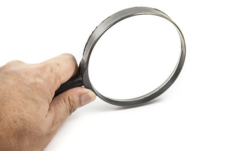 Man's hand, holding classic styled magnifying glassの写真素材