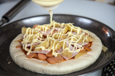 Closeup making pizzaの写真素材