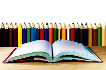 Open book on wood table over  の写真素材