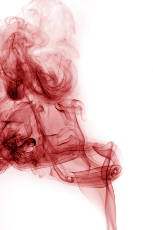 Red smoke on a white backgroundの写真素材
