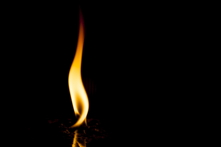 Fire flames on black backgroundの写真素材