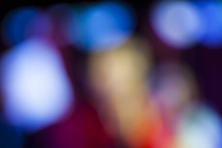 abstract background with bokeh defocused lightsの写真素材