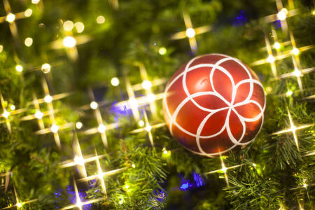 Christmas Tree decorations lit backgroundの写真素材