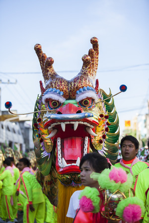 Udon Thani, Thailand -5 December 2014 Thailand  Father's Day ,Chinese dragon during Udon Thani Shrine Annual Golden Dragon,Lion Parade, Udon Thani Shrine Year celebrations 2014のeditorial素材