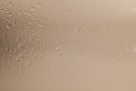 water drops on brown backgroundの写真素材