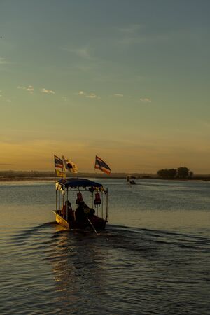 Sunrise, Boat off the coast of the Red Lotus Sea UdonThani, Thailandの写真素材
