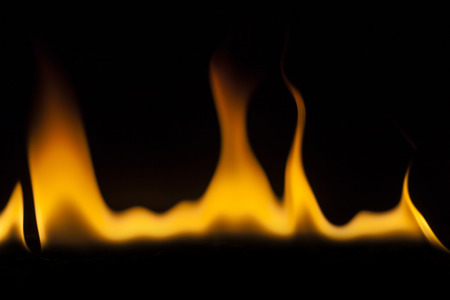 Fire flames on black backgroundの写真素材