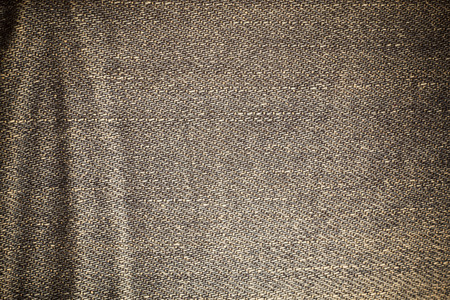 Old dirty blue jeans texture background.の写真素材