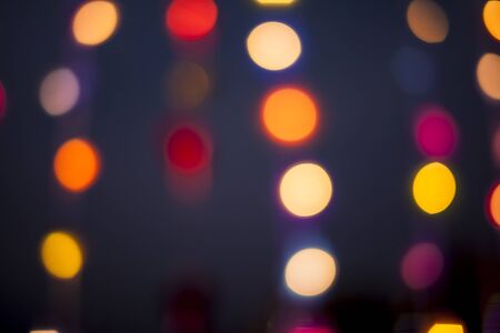 Blurred Street night pedestrians.