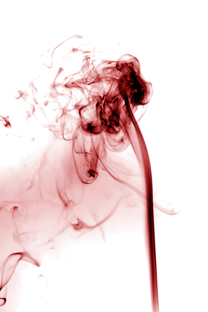 Red smoke on white background.の写真素材