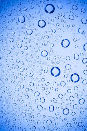 Water bubble on Blue glass.