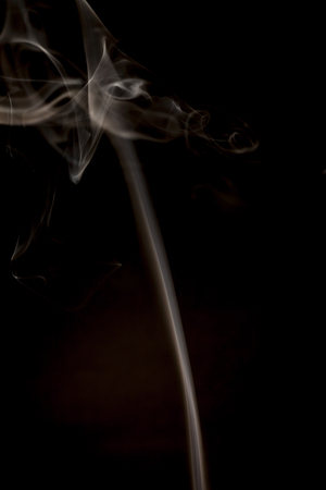 White smoke on black background.の写真素材