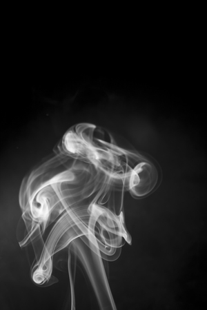 White smoke on black background.の写真素材