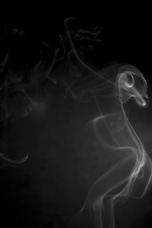 White smoke on black background.の写真素材