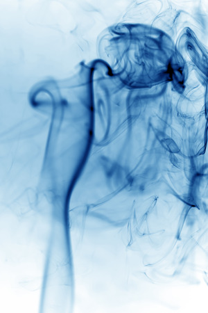 Blue  smoke on white backgroundの写真素材