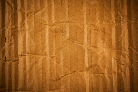 Crumpled brown cardboard texture.