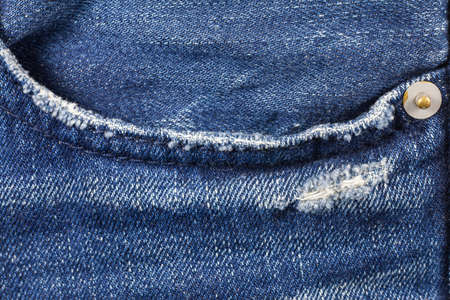 Jeans torn denim texture.