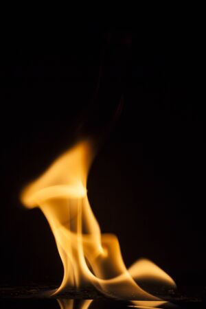 Fire flames on black background.の写真素材